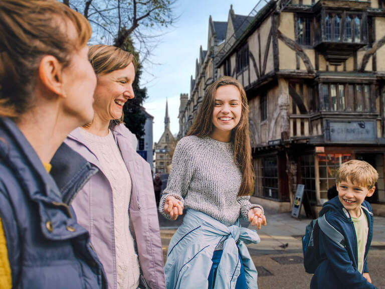 A family walking through the streets of Oxford
